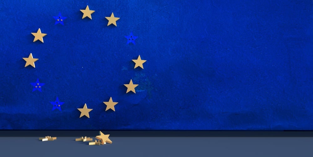 EU logo falling off of a wall